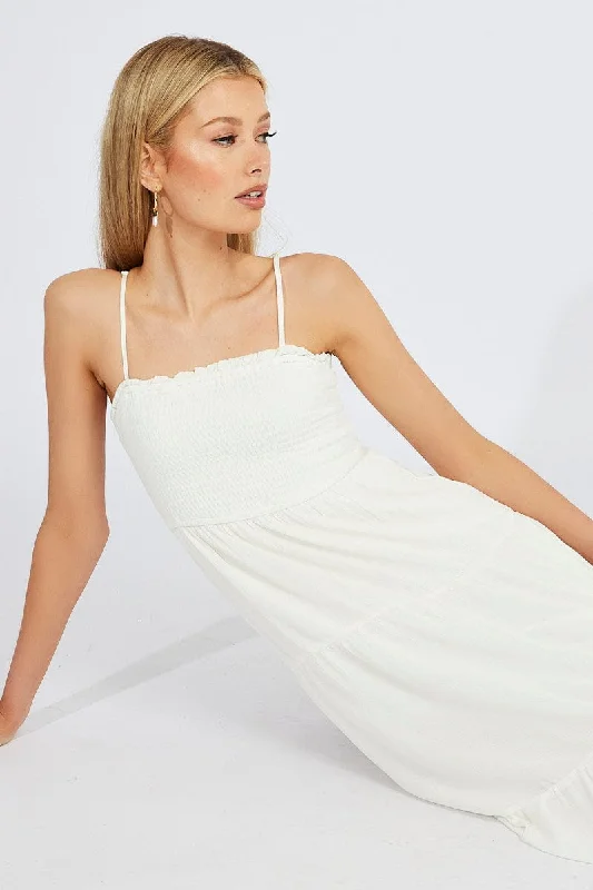 Midi dresses with tassel accents for a bohemian and free - spirited style White Midi Dress Sleeveless Shirred Tie Back
