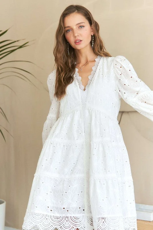 Mini dresses with geometric prints for a modern aesthetic ADORA Lace Detail Tiered Eyelet V-Neck Babydoll Dress Mini dresses with geometric prints for a modern aesthetic ADORA Lace Detail Tiered Eyelet V-Neck Babydoll Dress