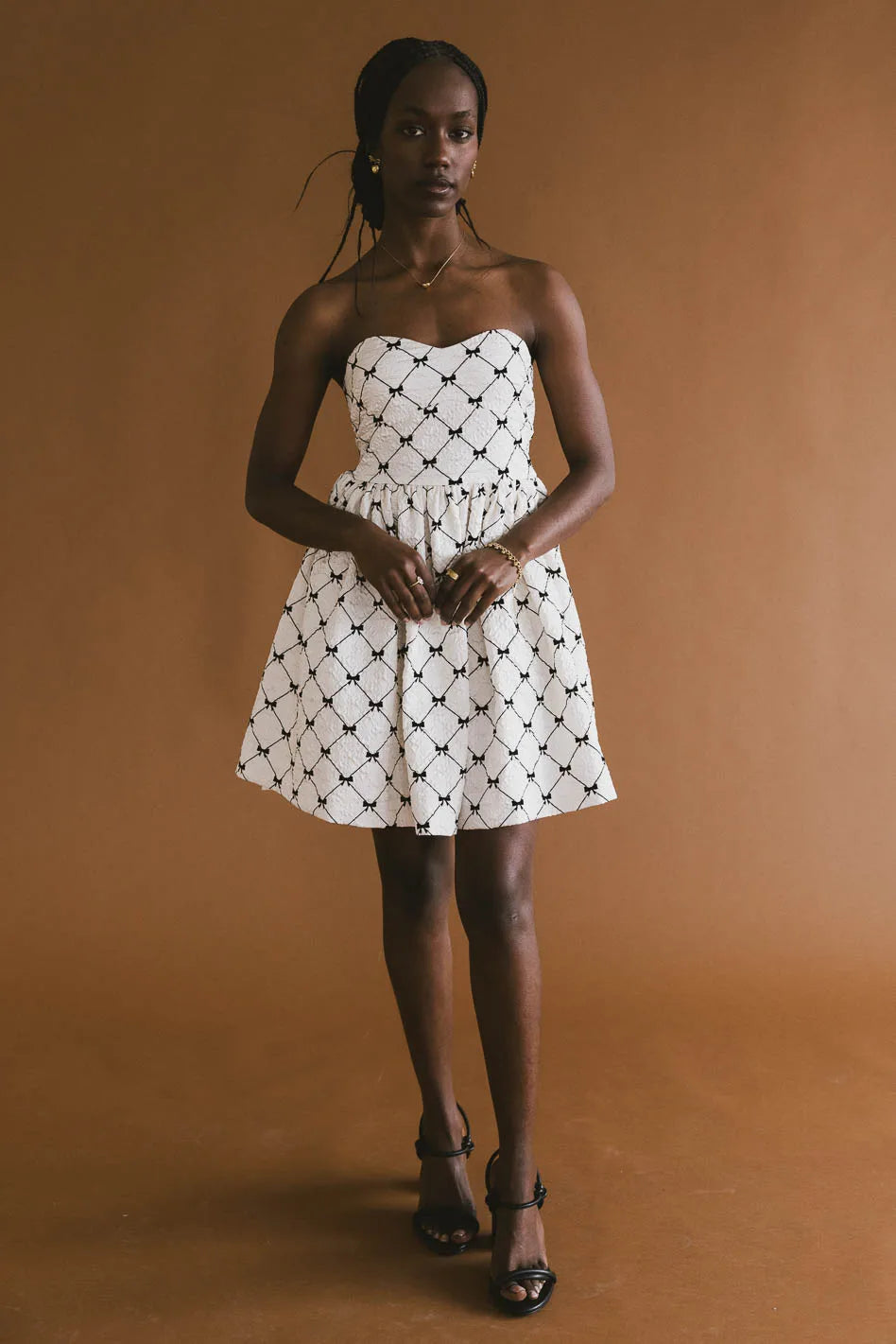 Mini dresses with high - low hems for a modern twist Sienna Bow Mini Dress