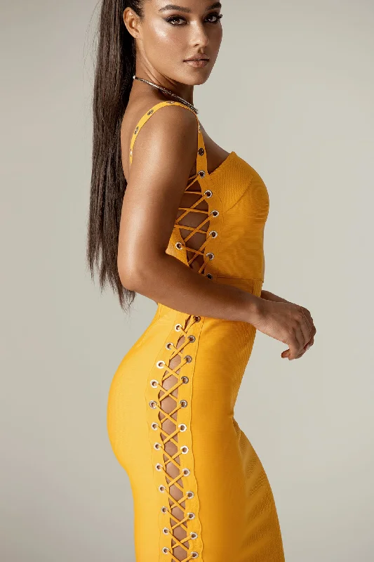 Midi dresses with pleated skirts for a timeless and elegant appeal Rebecca Bandage Lace Up Midi Dress (Sun Orange) Midi dresses with pleated skirts for a timeless and elegant appeal Rebecca Bandage Lace Up Midi Dress (Sun Orange)