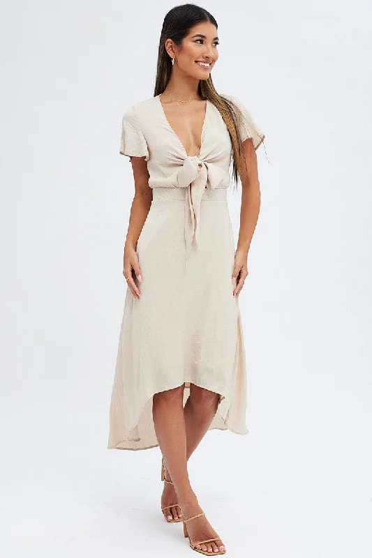 Maxi - inspired midi dresses with flowing fabrics for a beachy vibe Beige Midi Dress Short Sleeve Tie Back Satin Maxi - inspired midi dresses with flowing fabrics for a beachy vibe Beige Midi Dress Short Sleeve Tie Back Satin