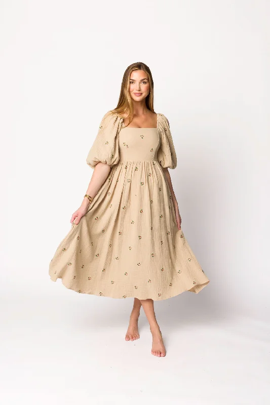 Midi dresses with animal prints for a bold and confident appearance Natalie Embroidered Floral Midi Dress in Taupe Midi dresses with animal prints for a bold and confident appearance Natalie Embroidered Floral Midi Dress in Taupe