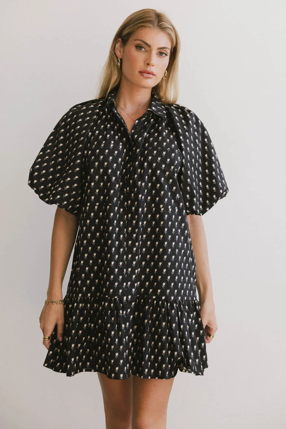 Mini dresses with side slits for a sexy appeal Miel Floral Mini Dress