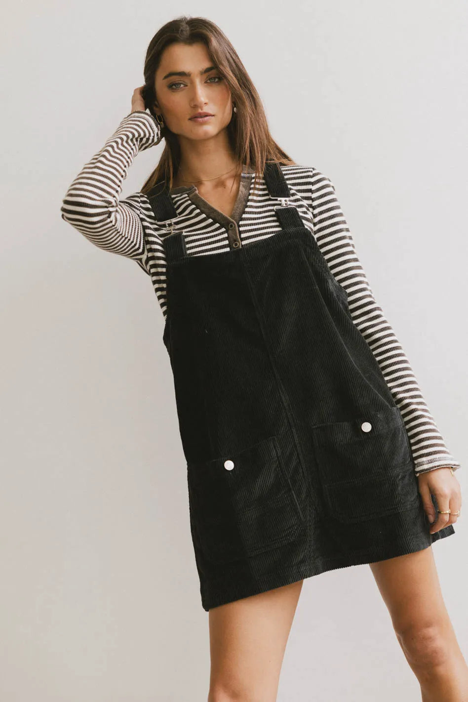 Velvet mini dresses for autumn weddings Reid Corduroy Overall Dress in Black
