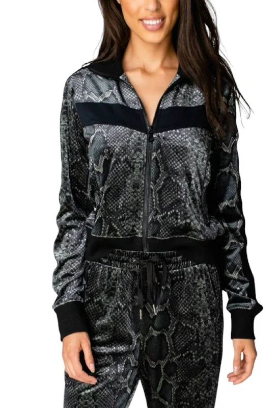 Embroidered women's cotton coats in a bohemian pattern for a unique designCarmela Velour Track Jacket In Olive Embroidered women's cotton coats in a bohemian pattern for a unique designCarmela Velour Track Jacket In Olive