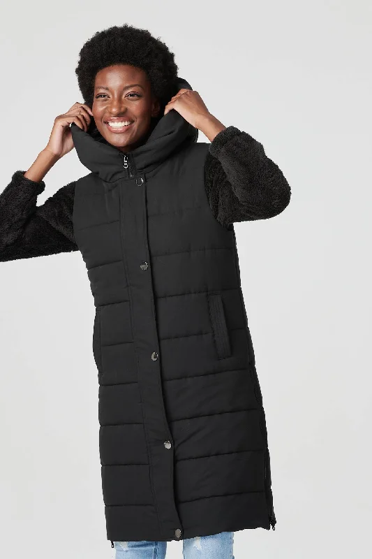 Women's cropped leather coats with silver studs for an edgy lookLongline Quilted Hooded Gilet Vest Women's cropped leather coats with silver studs for an edgy lookLongline Quilted Hooded Gilet Vest