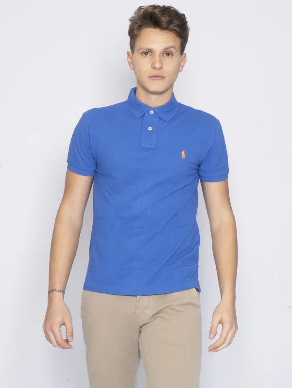 Polo shirt with a scalloped hem for a feminine detailPolo in Piqué Blu Iris
