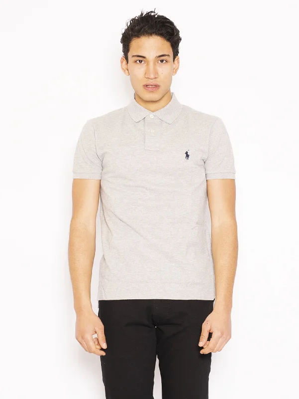 Solid color performance fabric polo shirt for sports activitiesPolo in Piquè Grigio