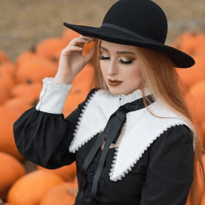 Ruffled Cuff Women Long Sleeve Top with a Feminine TouchWomen's Lolita Black&White Bow Neck Dresses